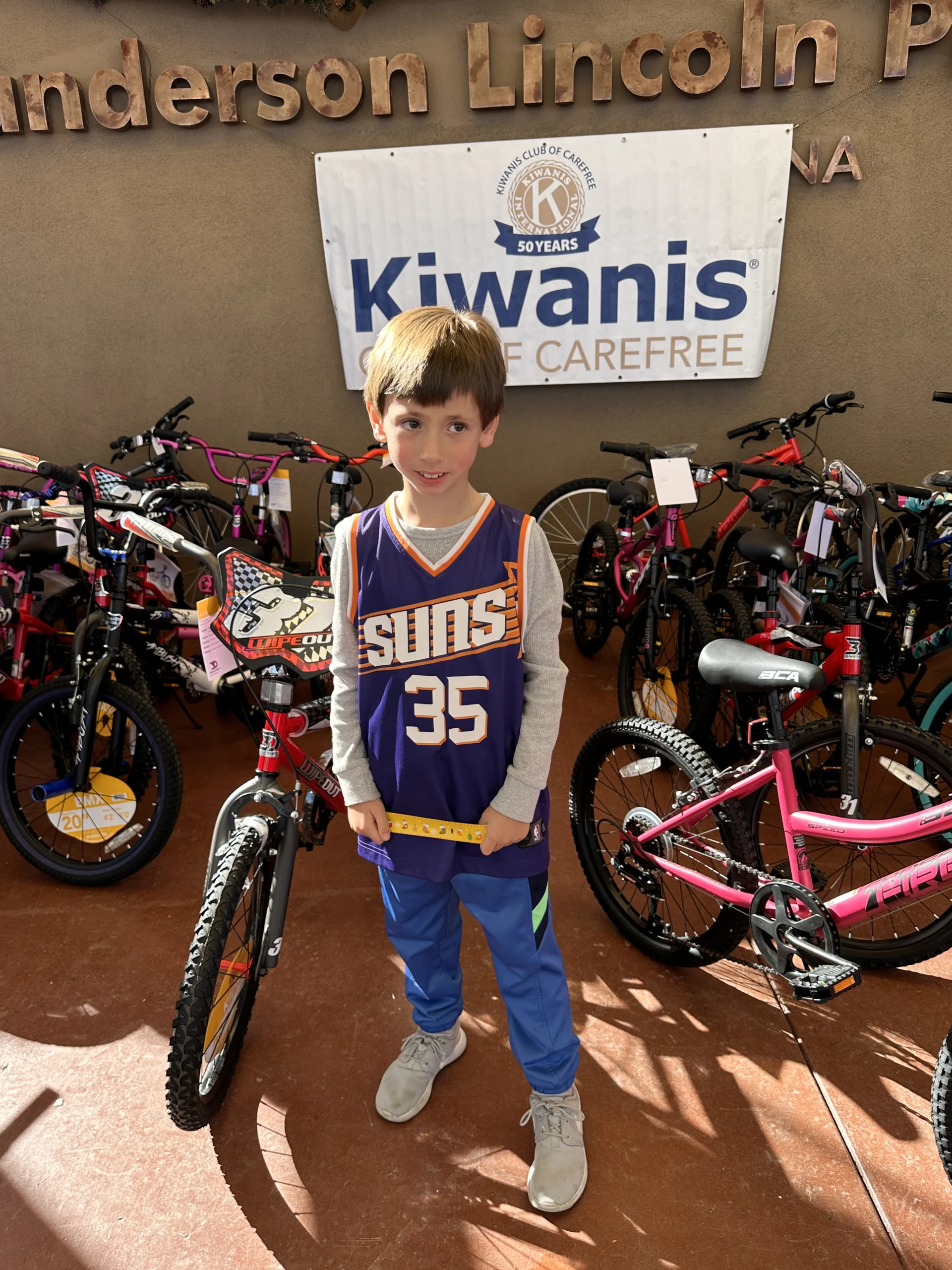 IMG_0716 bike giveaway at kiwanis christmas event in carefree
