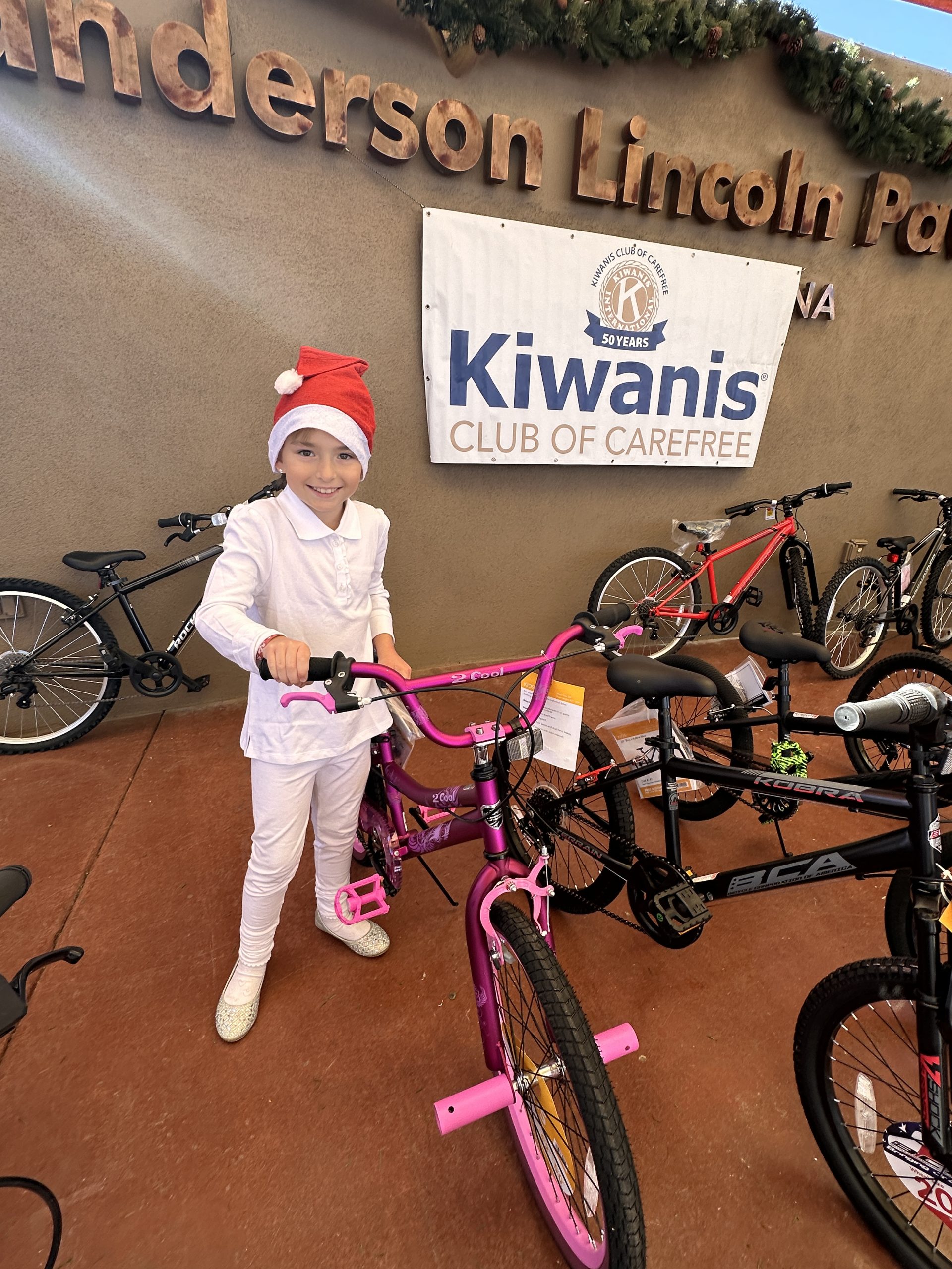 bike giveaway at kiwanis christmas event in carefree