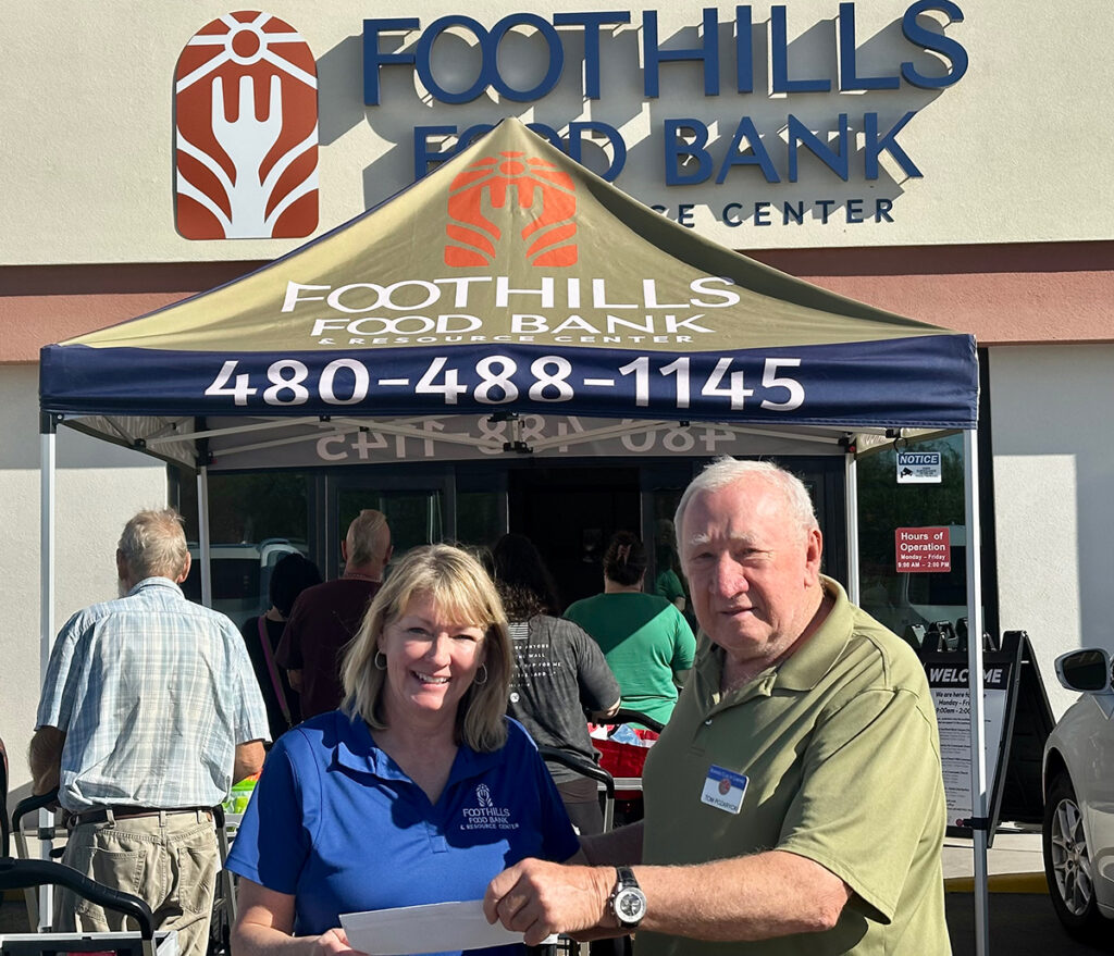 Kiwanis Funds Request Committee's presents Foodbank with grant check